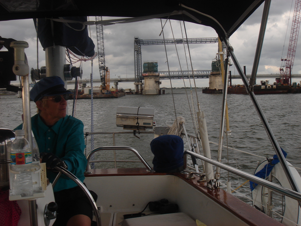 Captain Priscilla of Ace Lady at the helm